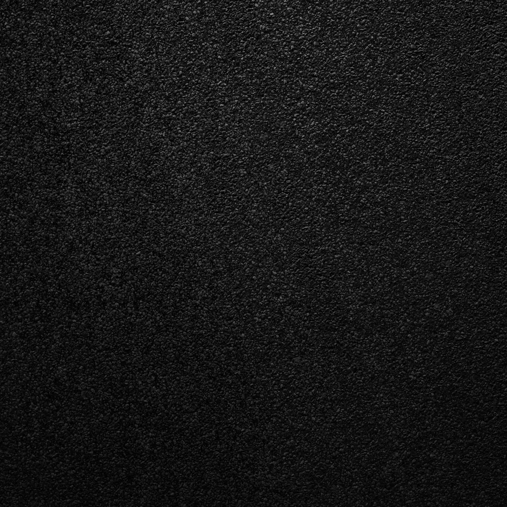 Close-up of asphalt pavement surface